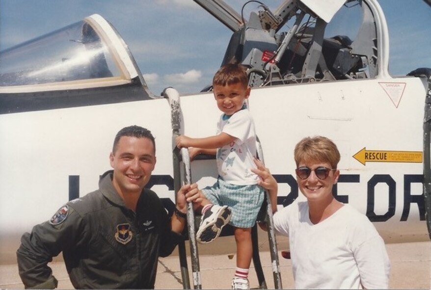 Long before Chris Mirarchi (center) was old enough to chase his own flying dream, he exhibited an affinity for the accoutrements of flight, like his dad. Here Lt. Col. Joe Mirarchi, his wife Teresa and Chris pose in front of dad’s airplane at Reese Air Force Base, Texas following Joe's active duty fini flight.