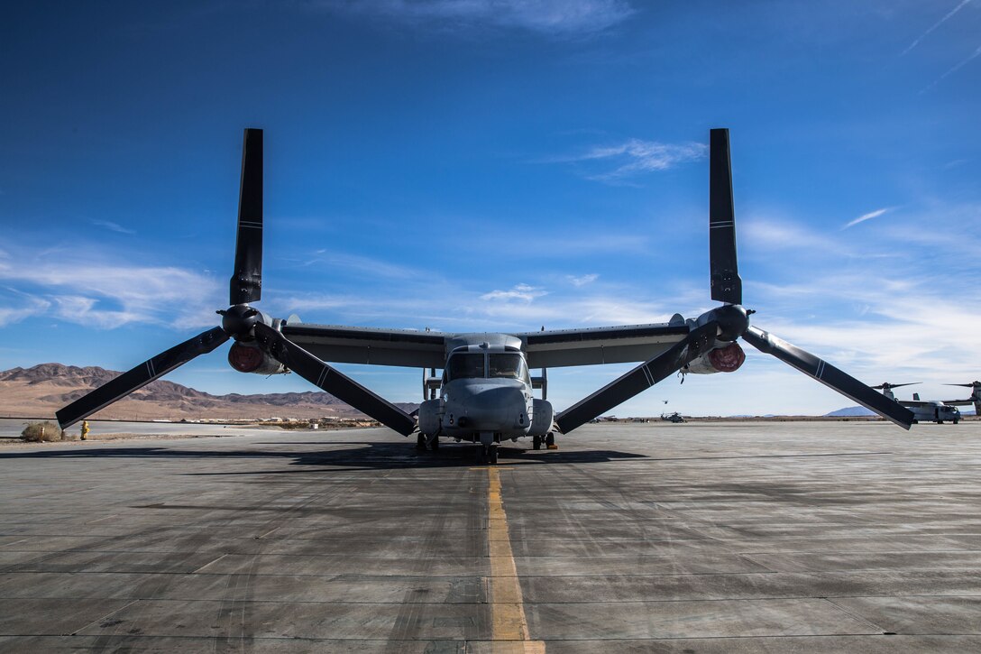 MV-22 Osprey awaits Marines with 3rd Reconnaissance Battalion, 3rd Marine Division, 3rd Marine Expeditionary Force at the Air Combat Element landing strip at Marine Corps Air Ground Combat Center, Twentynine Palms, Calif., Jan. 18, 2018, as a part of Integrated Training Exercise 2-18. The purpose of ITX is to create a challenging, realistic training environment that produces combat-ready forces capable of operating as an integrated MAGTF. (U.S. Marine Corps Photo by Pfc. William Chockey)