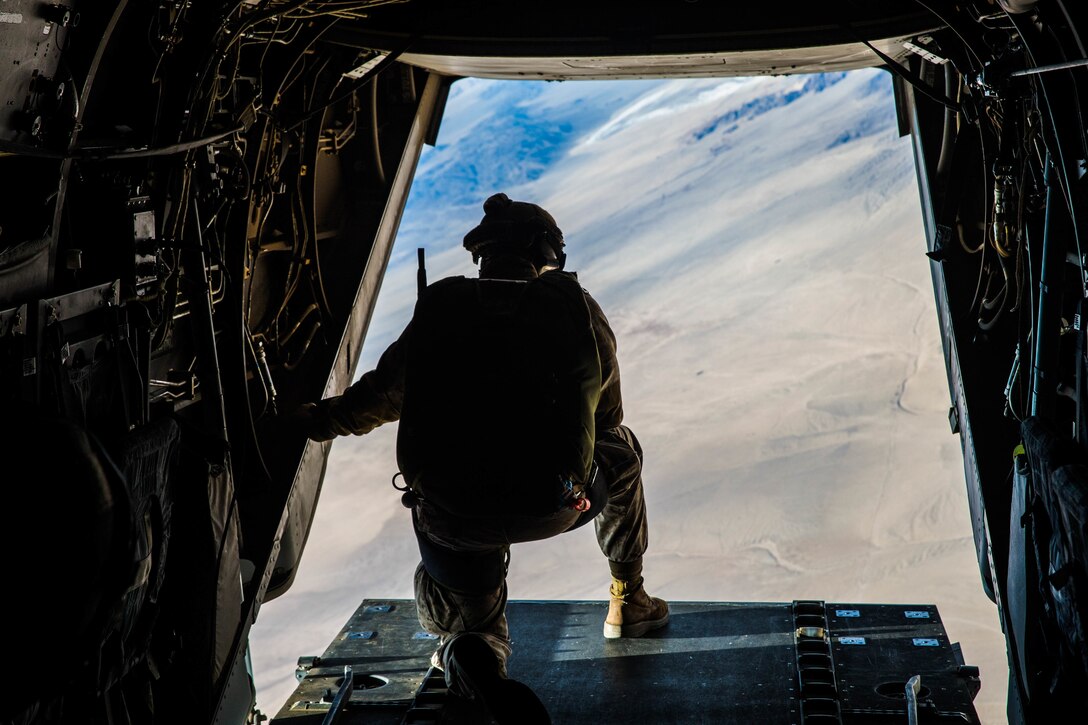 MV-22 Osprey awaits Marines with 3rd Reconnaissance Battalion, 3rd Marine Division, 3rd Marine Expeditionary Force at the Air Combat Element landing strip at Marine Corps Air Ground Combat Center, Twentynine Palms, Calif., Jan. 18, 2018, as a part of Integrated Training Exercise 2-18. The purpose of ITX is to create a challenging, realistic training environment that produces combat-ready forces capable of operating as an integrated MAGTF. (U.S. Marine Corps Photo by Pfc. William Chockey)