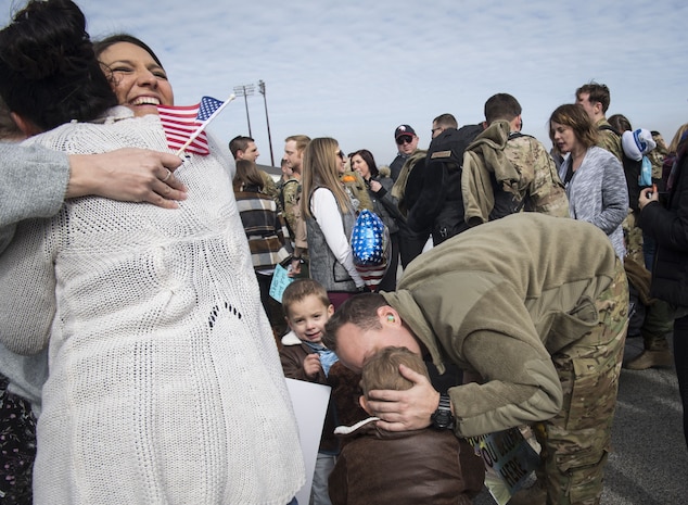 Family members and friends greet Airmen from the 15th Airlift Squadron and 437th Maintenance Group after returning to Joint Base Charleston, S.C., Feb. 3, 2018, from a Southwest Asia deployment.
