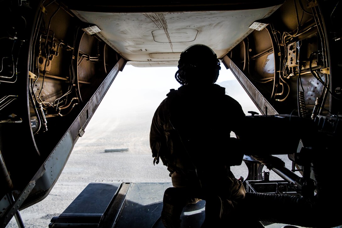 A Marine with Marine Wing Support Squadron 371 scans the skies in an MV-22 Osprey at Marine Corps Air Ground Combat Center, Twentynine Palms, Calif., Feb. 4, 2018, as a part of Integrated Training Exercise 2-18. The purpose of ITX is to create a challenging, realistic training environment that produces combat-ready forces capable of operating as an integrated MAGTF. (U.S. Marine Corps Photo by Pfc. William Chockey)