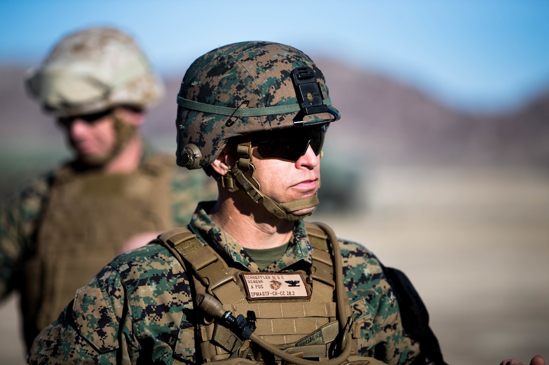 Col. George C. Schreffler III, Commanding Officer, Special Purpose Marine Air Ground Task Force 5 observers Forward Arming and Refueling Point at Marine Corps Air Ground Combat Center, Twentynine Palms, Calif., Feb. 4, 2018, as a part of Integrated Training Exercise 2-18. The purpose of ITX is to create a challenging, realistic training environment that produces combat-ready forces capable of operating as an integrated MAGTF. (U.S. Marine Corps Photo by Pfc. William Chockey)