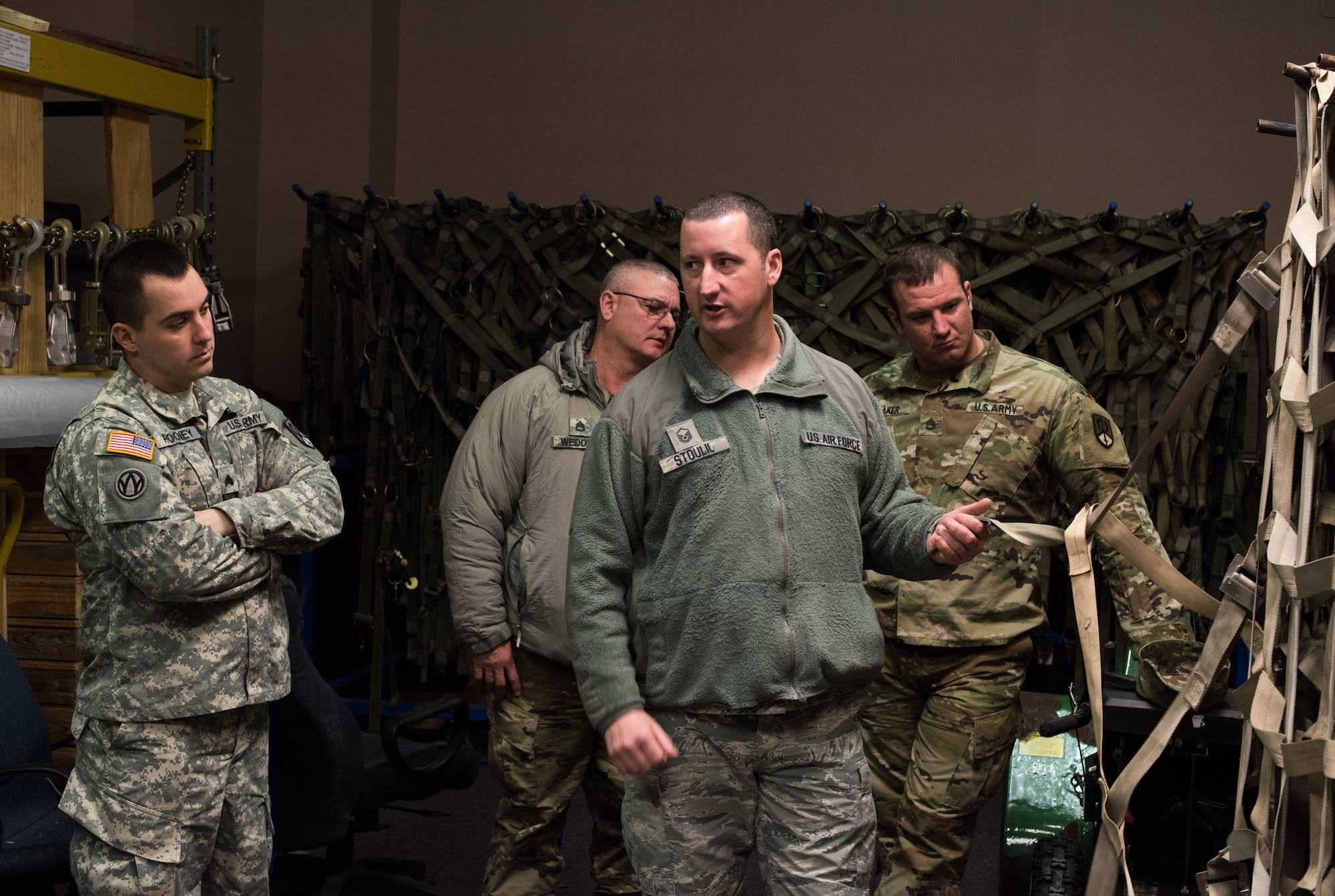 U.S. Air Force Master Sgt. Chad Stoulil, 55th Logistics Readiness Squadron Small Aircraft Terminal superintendent, teaches a cargo preparation course to Soldiers from the U.S. Army Reserve 561 st Regional Support Group at Offutt Air Force Base, Nebraska, Jan. 29, 2018. To prepare for joint operations in deployed environments, the Soldiers learned the details of effective and safe pallet building for air shipments. (U.S. Air Force photo by Senior Airman Jacob Skovo)