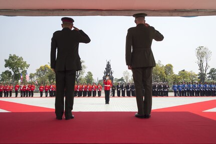 Marine Corps Gen. Joe Dunford, chairman of the Joint Chiefs of Staff, renders honors with Thai Army Gen. Tarnchaiyan Srisuwan, chief of the Defense Force, at the Royal Thai Armed Forces Headquarters in Bangkok, Feb. 7, 2018.