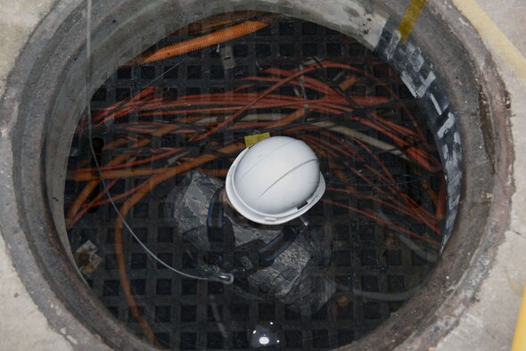 U.S. Air Force Airman 1st Class Aryn Stark, 39th Communications Squadron cable and antenna systems technician, conducts a preventive maintenance inspection on fiber optic and copper communication cables at Incirlik Air Base, Turkey, Jan. 16, 2018.