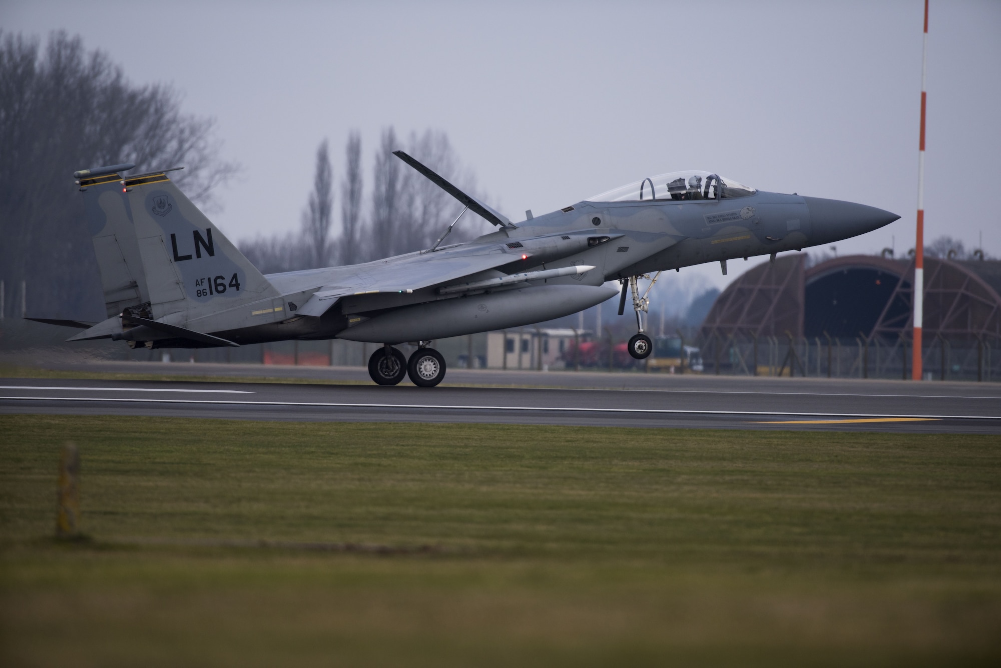 An F-15C from the 493rd Fighter Squadron lands at Royal Air Force Lakenheath, England, Feb. 6, 2018. The F-15C is an all-weather, extremely maneuverable, tactical fighter designed to permit the Air Force to gain and maintain air supremacy over the battlefield. (U.S. Air Force photo/Senior Airman Malcolm Mayfield)