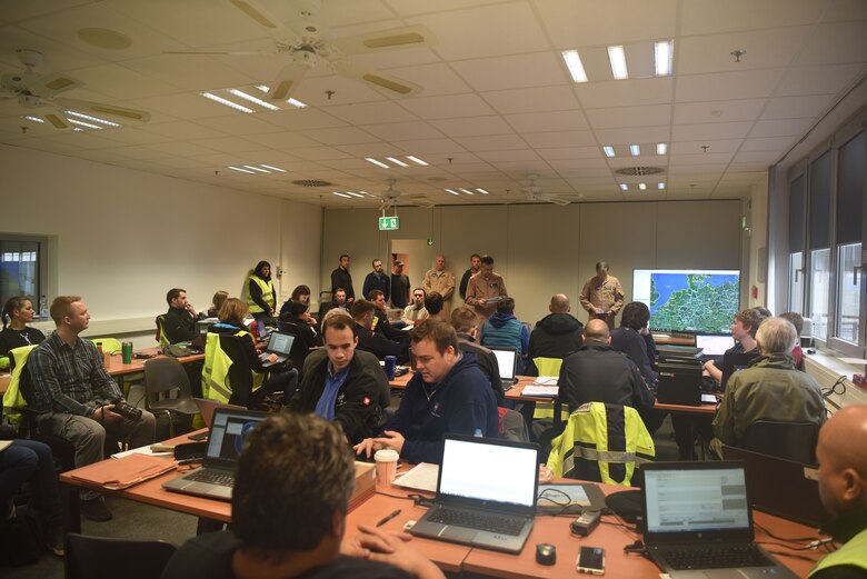 NASA and German Aerospace scientists meet on Ramstein Air Base, Germany, Jan. 31, 2018, before their last few biofuel testing flights. The scientists met every morning before a flight to discuss weather conditions and mission objectives.