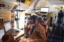 Adam Webster, NASA Armstrong flight research center mission director, monitors contrail emissions and flight patterns midflight Jan. 31, 2018. Webster aided in finding aircraft that were in the area so his pilots could request to monitor their emissions from behind.