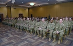 South Carolina Army National Guard Soldiers in the 678th Air Defense Artillery Brigade, South Carolina National Guard, are recognized by friends and family, during a deployment and casing of the colors ceremony held at the Brookland Baptist Church, West Columbia, South Carolina, Feb. 1, 2018.