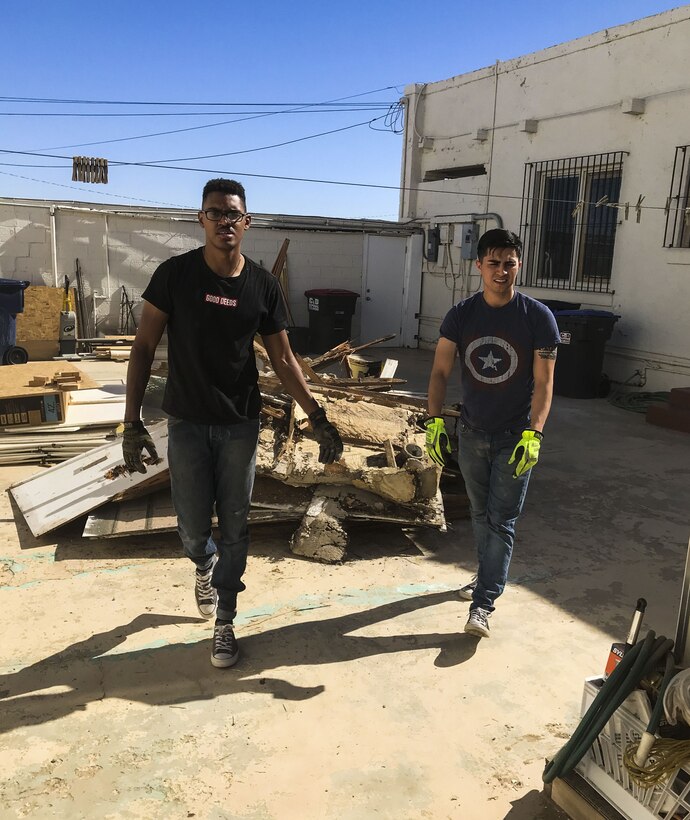 U.S. Marine Corps Cpl. Isaac D. Martinez and Lance Cpl. Joel Soriano, both strategic communication specialists with to Marine Corps Air Station (MCAS) Yuma’s Headquarters & Headquarters Squadron, volunteer their Saturday to tear down a shed at St. Thomas Yuma Indian Mission in Winterhaven, Calif., Feb. 3, 2018. The mission, located out in the local Yuma community, requested help in tearing down the shed so that renovations could be made to the building. (U.S. Marine Corps photo taken by Cpl. Isaac Martinez)