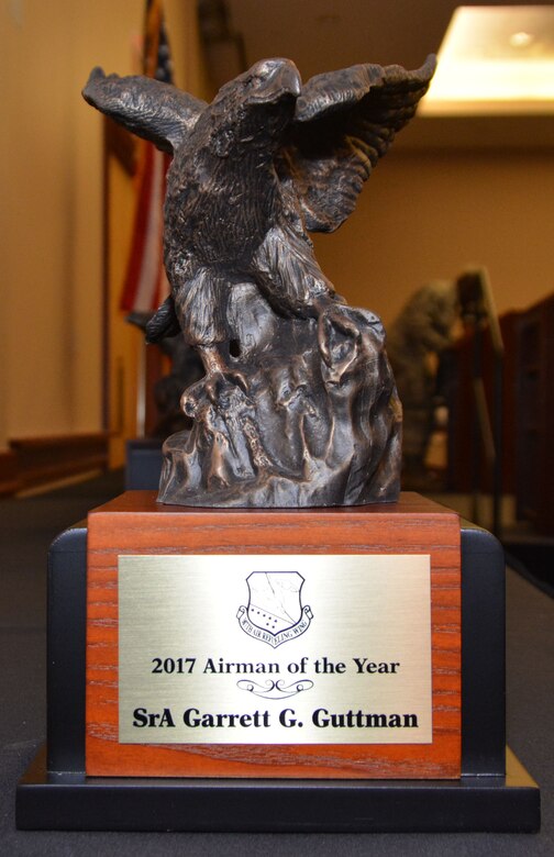 Senior Airman Garrett Guttman, 507th Civil Engineer Squadron, is awarded the 2017 507th ARW Airman of the Year award at the 507th Air Refueling Wing Annual Awards banquet Feb. 3, 2018, in Midwest City, Okla. (U.S. Air Force photo/Tech. Sgt. Samantha Mathison)