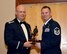 Col. Travis Caughlin, 507th Maintenance Group commander, presents the 2017 507th MXG Maintenance Professional of the Year award in the Noncommissioned Officer category for outstanding performance to Master Sgt. Daniel Pierce, 507th Maintenance Squadron, Feb. 3, 2018, in Midwest City, Okla. (U.S. Air Force photo/Tech. Sgt. Samantha Mathison)