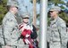 U.S. Air Force Senior Airmen Cody Burgan, left, Allison Burkett and Esteban Cruz, Senior Master Sgt. David B. Reid Airmen Leadership School flag detail team members, collect a flag at Shaw Air Force Base, S.C., Feb. 2, 2018.