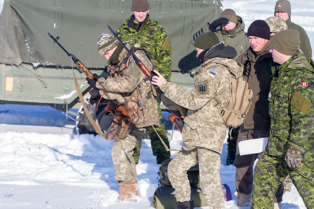 Ukranian soldiers prepare to fire on a range