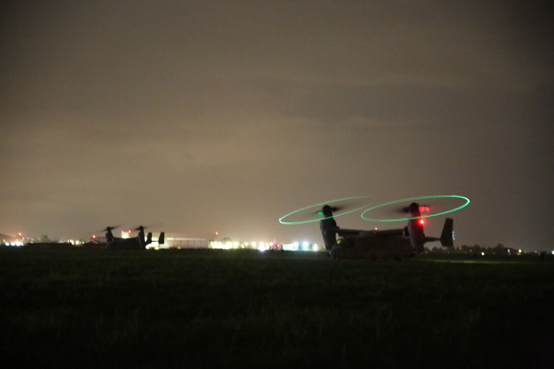 U.S. Marine Corps MV-22B Ospreys prepare to take off during an alert force rehearsal conducted by Marines assigned to Special Purpose Marine Air-Ground Task Force-Crisis Response-Africa aboard Naval Air Station Sigonella, Italy, Dec. 27, 2017. SPMAGTF-CR-AF is deployed to conduct limited crisis-response and theater-security operations in Europe and Africa. (U.S Marine Corps Photo by Lance Cpl. Patrick Osino)