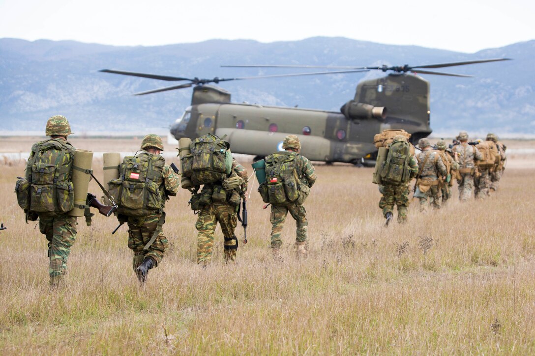 Marines with Black Sea Rotational Force 17.2 and Greek Marines with 32nd Marine Brigade prepare to conduct force-on-force training during Exercise Alexander the Great in Volos, Greece Jan. 17. The U.S. Marines are training alongside their Greek counterparts to strengthen an already strong NATO partnership and support peace and stability in the region.