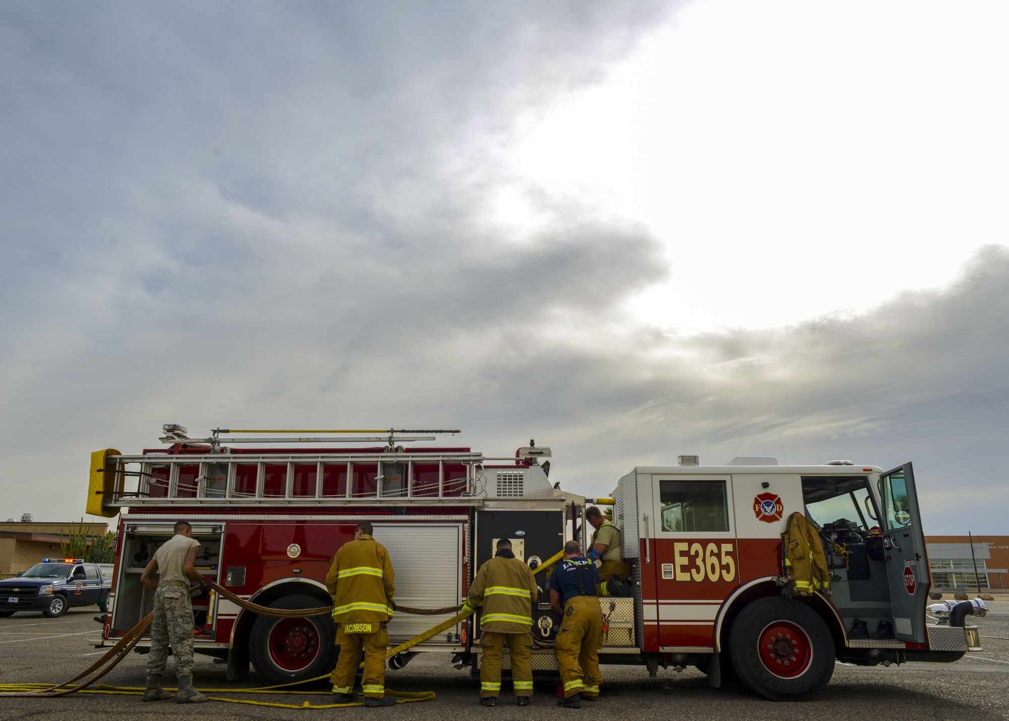 Airmen assigned to the 56th Civil Engineer Squadron pack up their equipment after structural firefighting training at Luke Air Force Base, Ariz., Jan. 16, 2018. Firefighters use hands-on, realistic training scenarios to better prepare them for real-world situations. (U.S. Air Force photo/Airman 1st Class Caleb Worpel)