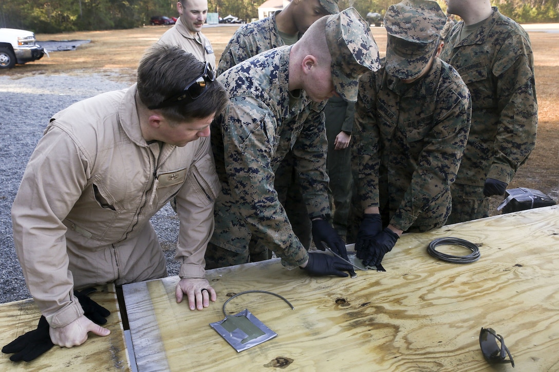 Marines practice using a detonating cord.