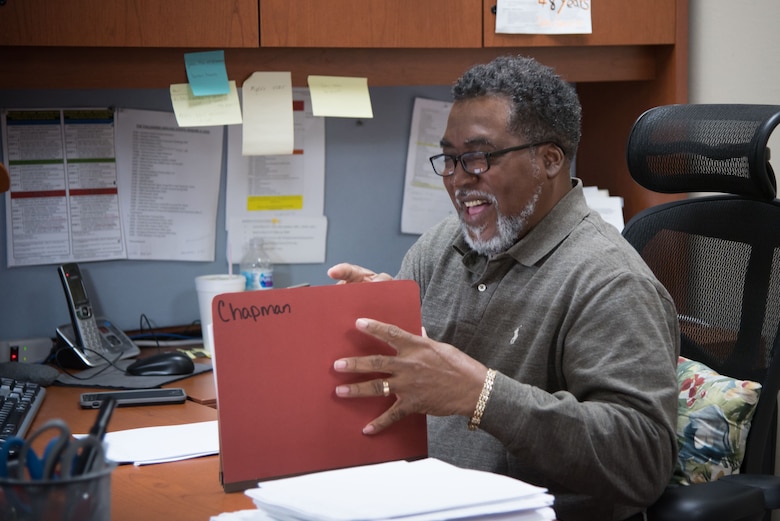 Gary Wallace, 53rd Weather Reconnaissance Sqadron aviation resource managment technician, checks squadron member personnel folders Jan. 29, 2018 at Keesler Air Force Base, Mississippi. Wallace retired Feb. 2, 2018 after more than 40 years of active duty and civil service to the Air Force. (U.S. Air Force photo by Staff Sgt. Heather Heiney)
