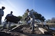 U.S. Air Force 2nd Lt. Stone Williford, 20th Civil Engineer Squadron real property specialist, removes dirt to level the ground at Shaw Air Force Base, S.C., Feb. 6, 2018.