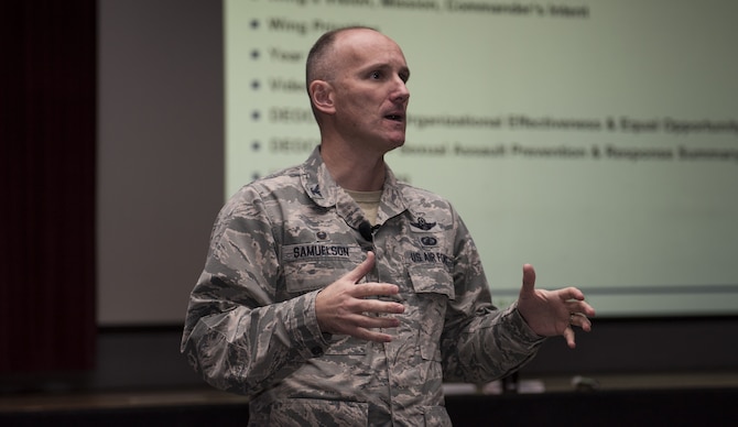Col. Ryan Samuelson, 92nd Air Refueling Wing commander, speaks with Airmen during a Wing All Call Feb, 6, 2018 at Fairchild Air Force Base, Washington. Samuelson spoke with Team Fairchild about their accomplishments in 2017. He also covered various topics to include: The blended retirement system, Defense Equal Opportunity organizational climate survey results, enlisted performance reports, full spectrum readiness, upcoming events and Fairchild’s way forward for 2018. (U.S. Air Force photo/Senior Airman Sean Campbell)