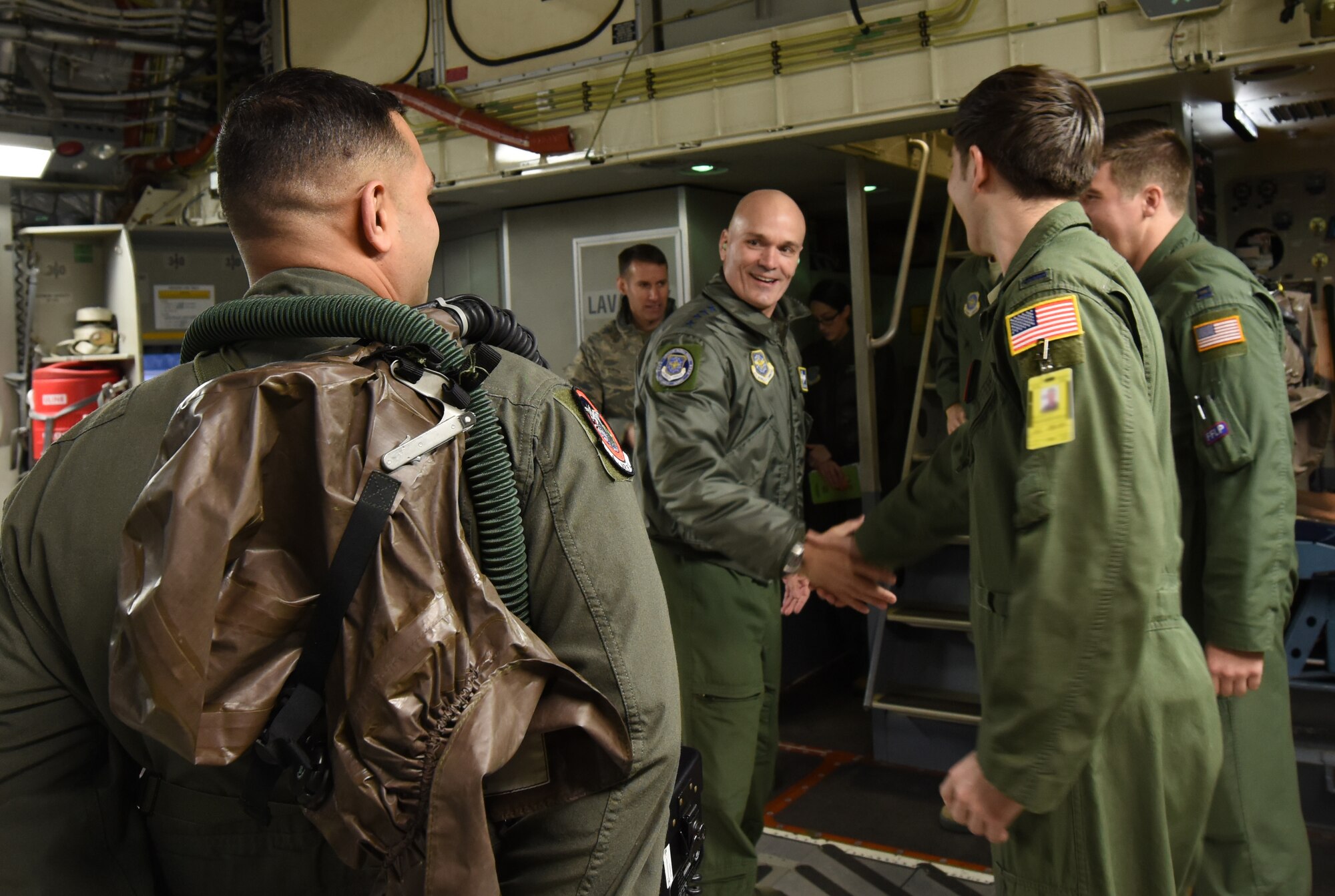 Gen. Carlton D. Everhart II, Air Mobility Command commander, meets 1st Lt. John Dewilder, 4th Airlift Squadron pilot, while greeting the C-17 Globemaster III crew of a C-17 Globemaster III he would be flying with at Joint Base Lewis-McChord, Wash., Jan. 25, 2018. Everhart visited JBLM to witness full-spectrum readiness in action during Team McChord’s Exercise Winterhook. (U.S. Air Force photo by Senior Airman Tryphena Mayhugh)