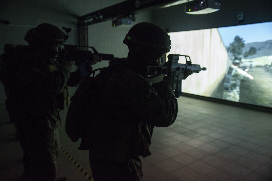 U.S. Marines with Special Purpose Marine Air-Ground Task Force-Crisis Response-Africa train with G36 service rifles in a virtual simulator at the San Fernando Barracks, Spain, Jan. 9, 2017. SPMAGTF-CR-AF is deployed to conduct limited crisis-response and theater-security operations in Europe and North Africa. (U.S. Marine Corps photo by Sgt. Takoune H. Norasingh/Released)