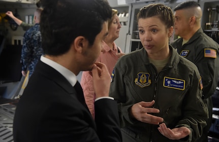 U.S. Air Force Staff Sgt. Nichole Bryant, 315th Aeromedical Evacuation Squadron, talks to a North Atlantic Treaty Organization Parliamentary Assembly Defense and Security Committee member during a tour of a C-17 Globemaster III as part of a Congressional Delegation and NATO Partners event Feb. 8, at Joint Base Charleston, S.C. The visit provided NATO PA members an opportunity to speak with JB Charleston leadership, tour a C-17 Globemaster III, receive a briefing focused on aeromedical evacuation and learn about the Transportation Isolation System’s capabilities.