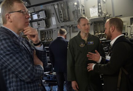 U.S. Air Force Capt. Derek Martindale, 315th Aeromedical Evacuation Squadron, talks to a North Atlantic Treaty Organization Parliamentary Assembly Defense and Security Committee member during a tour of a C-17 Globemaster III as part of a Congressional Delegation and NATO Partners event Feb. 8, at Joint Base Charleston, S.C. The visit provided NATO PA members an opportunity to speak with JB Charleston leadership, tour a C-17 Globemaster III, receive a briefing focused on aeromedical evacuation and learn about the Transportation Isolation System’s capabilities