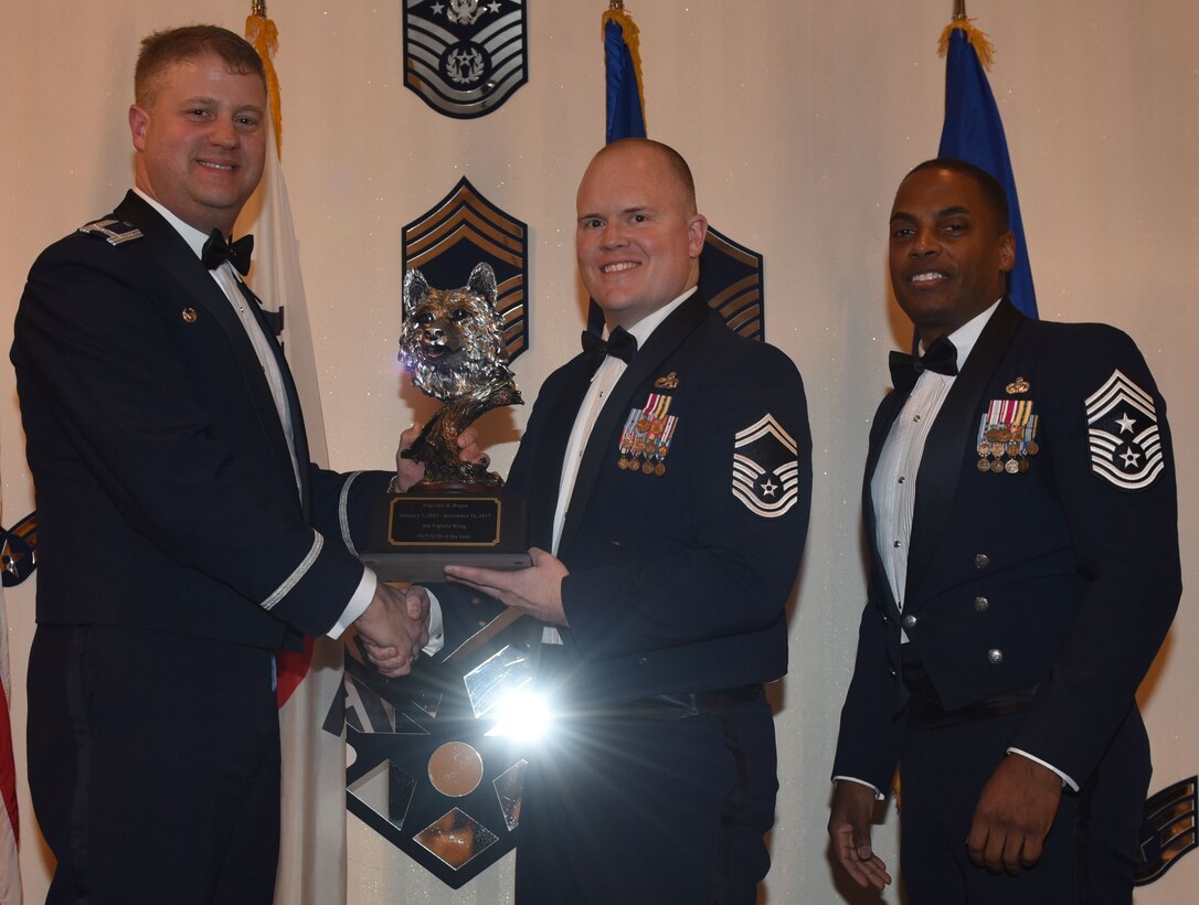 Winners of the 8th Fighter Wing 2017 Annual Awards pose for a photo during the "Night of the Stars" banquet at Kunsan Air Base, Republic of Korea, Feb. 9, 2018. The winners were selected at the top performers in their respective categories for the 2017 calendar year.