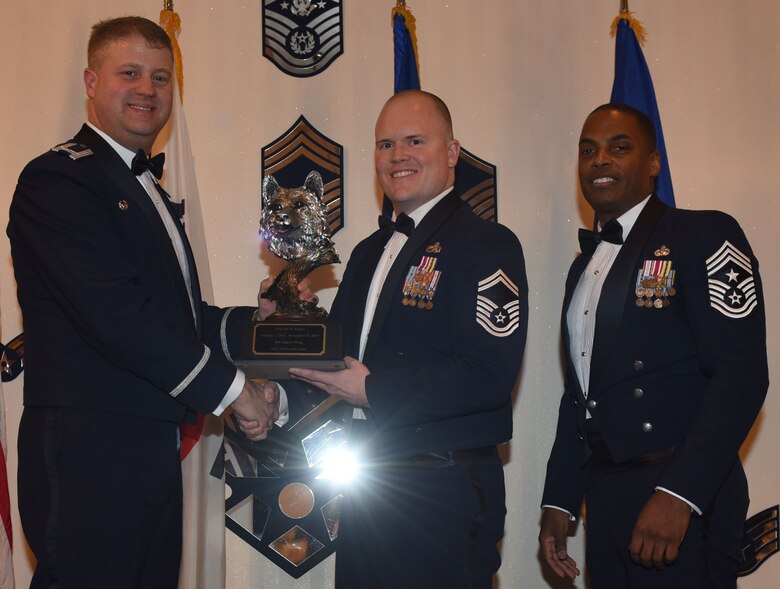 Winners of the 8th Fighter Wing 2017 Annual Awards pose for a photo during the "Night of the Stars" banquet at Kunsan Air Base, Republic of Korea, Feb. 9, 2018. The winners were selected at the top performers in their respective categories for the 2017 calendar year.