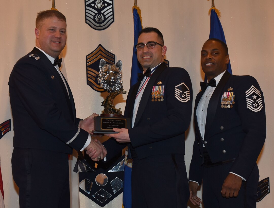 Winners of the 8th Fighter Wing 2017 Annual Awards pose for a photo during the "Night of the Stars" banquet at Kunsan Air Base, Republic of Korea, Feb. 9, 2018. The winners were selected at the top performers in their respective categories for the 2017 calendar year.