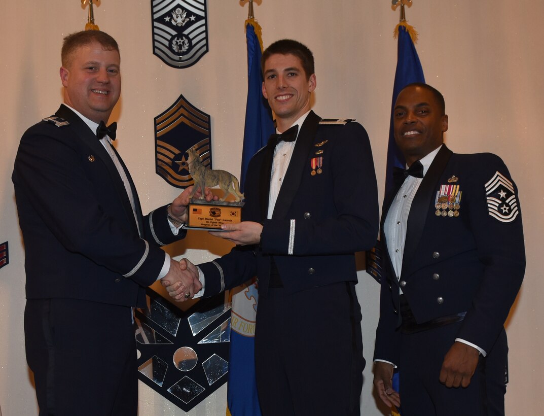Winners of the 8th Fighter Wing 2017 Annual Awards pose for a photo during the "Night of the Stars" banquet at Kunsan Air Base, Republic of Korea, Feb. 9, 2018. The winners were selected at the top performers in their respective categories for the 2017 calendar year.