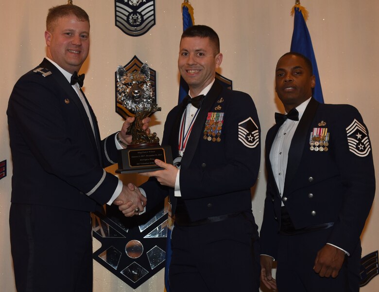 Winners of the 8th Fighter Wing 2017 Annual Awards pose for a photo during the "Night of the Stars" banquet at Kunsan Air Base, Republic of Korea, Feb. 9, 2018. The winners were selected at the top performers in their respective categories for the 2017 calendar year.