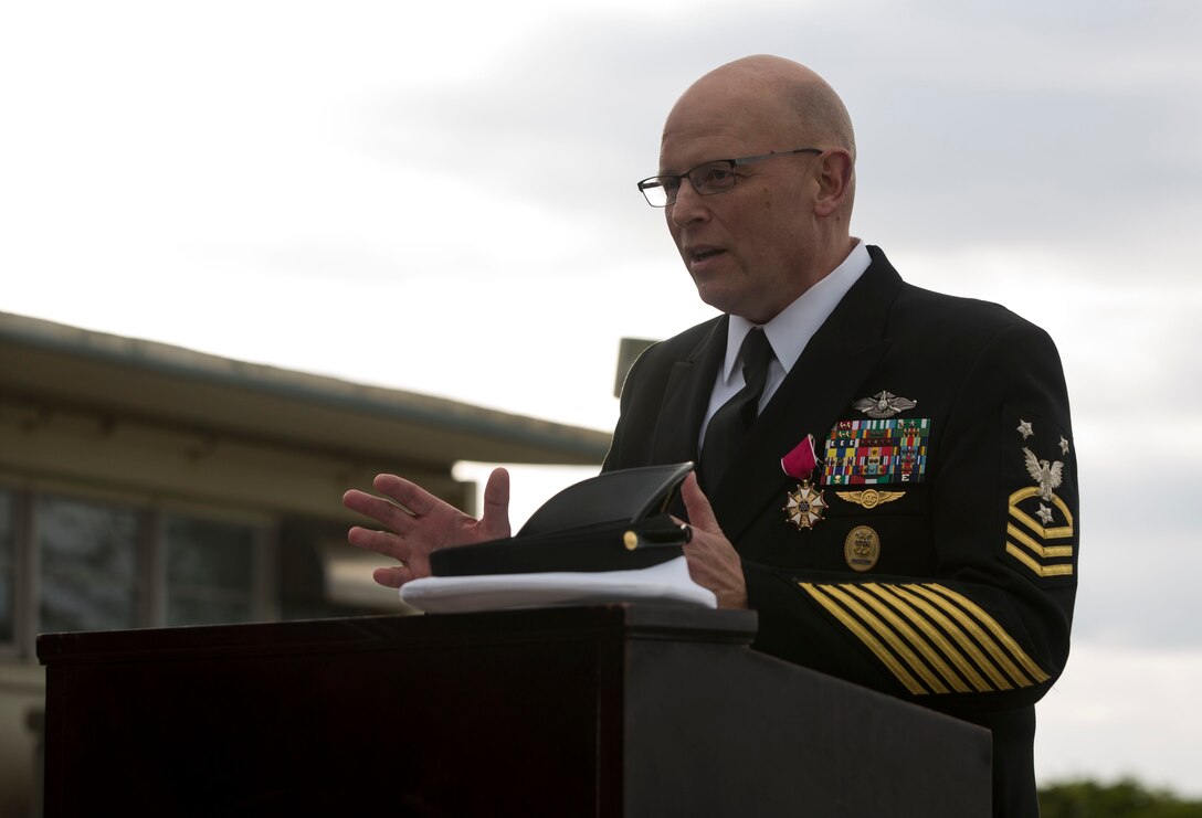 III Marine Expeditionary Force Command Master Chief Petty Officer Michael J. Fasano gives a farewell speech at Marine Corps Air Station Futenma, Okinawa, Japan on Feb. 9, 2018. Fasano enlisted in the Navy and attended recruit training December 1986 in San Diego, California. He retired after nearly 32 years of honorable service to the U.S. Navy.