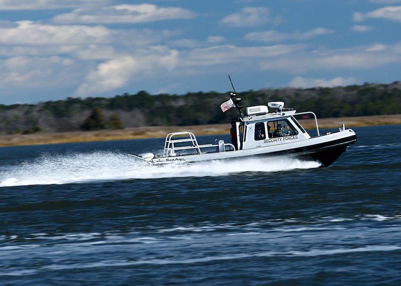 A 628th Security Forces Squadron harbor patrol boat cruises along the Cooper River at Joint Base Charleston, S.C. Feb. 5, 2018