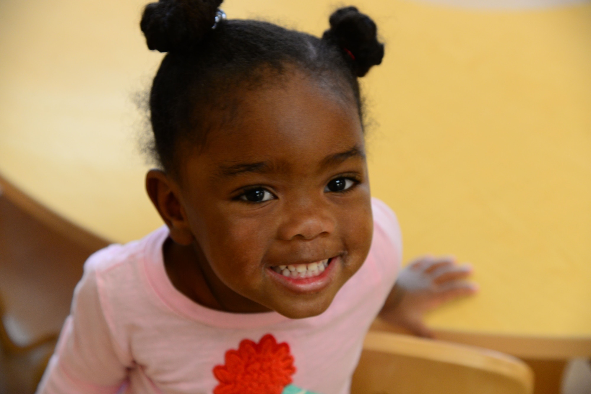 Ava, daughter of Tech. Sgt. Mia Johnson, 14th Force Support Squadron Logistics Manager, enjoys her time at the Child Development Center Feb. 5, 2018, on Columbus Air Force Base, Mississippi. Children are taught basic social skills that will help them as they get older. (U.S. Air Force photo by Airman 1st Class Beaux Hebert)