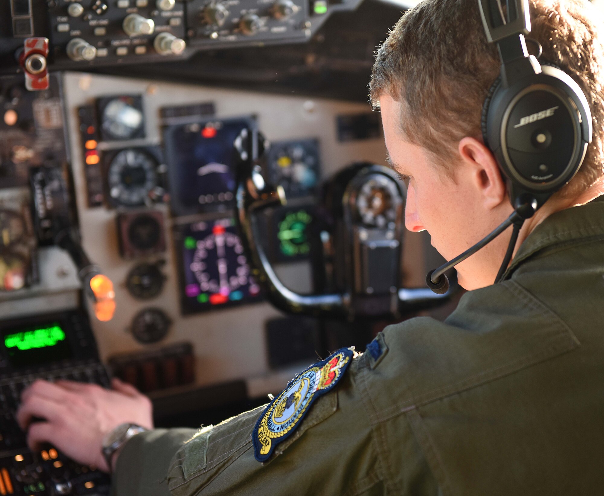 U.S. Air Force 1st Lt. Blake Kidd, 351st Air Refueling Squadron pilot puts coordinates into a KC-135 navigation system before take-off for air refueling training with U.S. Air Force F-16Cs Fighting Falcons, on RAF Mildenhall, England, Feb. 8, 2018. The training was in conjunction with a rotational deployment of U.S. Air Force F-16C Fighting Falcons from the Ohio Air National Guard’s 180th Fighter Wing to Amari Air Base, Estonia, as part of a Theater Security Package. (U.S. Air Force photo by Airman 1st Class Luke Milano)