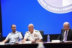 Panelists open a summit on opioids at U.S. Southern Command headquarters.