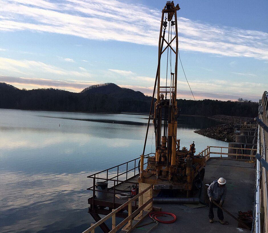 U.S. Army Corps of Engineers, Mobile District, Senior Driller Eddie in January Woods drills holes in the Carters Reregulation Dam, Jan. 24, as part of a multi-district effort to cut a slot in the dam and relieve stress caused by concreate expansion. The holes will allow the Nashville District to feed diamond rope through the hole to cut a slot dam to relieve the stress.