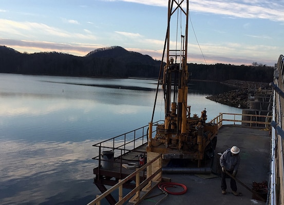 U.S. Army Corps of Engineers, Mobile District, Senior Driller Eddie in January Woods drills holes in the Carters Reregulation Dam, Jan. 24, as part of a multi-district effort to cut a slot in the dam and relieve stress caused by concreate expansion. The holes will allow the Nashville District to feed diamond rope through the hole to cut a slot dam to relieve the stress.