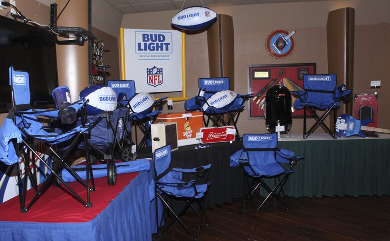 The prizes that were raffled to Marines and sailors during the Super Bowl LII party sit on display at the Brass and Rockers Club aboard the Marine Corps Air Ground Combat Center, Twentynine Palms, Calif., Feb. 4, 2018. The Brass and Rockers Club, formerly known as the Officers' Club opened its doors for Combat Center patrons to enjoy the super bowl. (U.S. Marine Corps photo by Cpl. Natalia Cuevas)