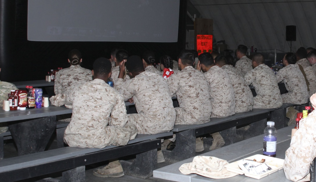 Marines and sailors watch Super Bowl LII on a large screen television in the Camp Wilson mess hall aboard the Marine Corps Air Ground Combat Center, Twentynine Palms, Calif., Feb. 4, 2018. The United Services Organization hosted the event to provide Marines and sailors a way to enjoy the game while in the field. (U.S. Marine Corps photo by Cpl. Natalia Cuevas)