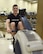 U.S. Air Force Senior Airman Jared Gerlach, the 2017 male rowing challenge winner from the 509th Aircraft Maintenance Squadron, uses an air rower during the Base vs. Base Rowing Challenge opening ceremony at Whiteman Air Force Base, Mo., Feb. 1, 2018. Although the 2018 competition is against other bases within the Air Force Global Strike Command, squadron and individual trophies will still be awarded.