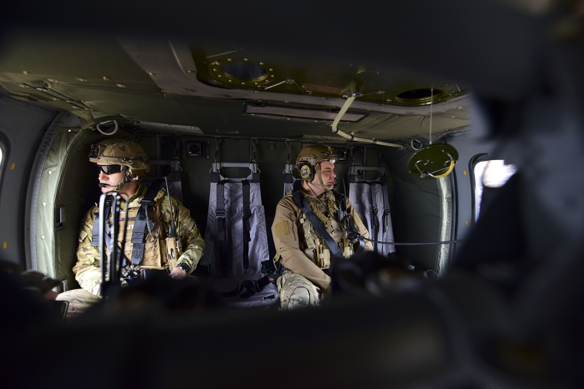 Joint Terminal Attack Controllers ride in a UH-0 Black Hawk during a joint training at Warsaw, Mo., Jan. 31, 2018. The training, titled Truman Relief, gave Whiteman Air Force Base, Mo., units the opportunity to go through scenarios involving JTACs capabilities. (U.S. Air Force by Staff Sgt. Danielle Quilla)