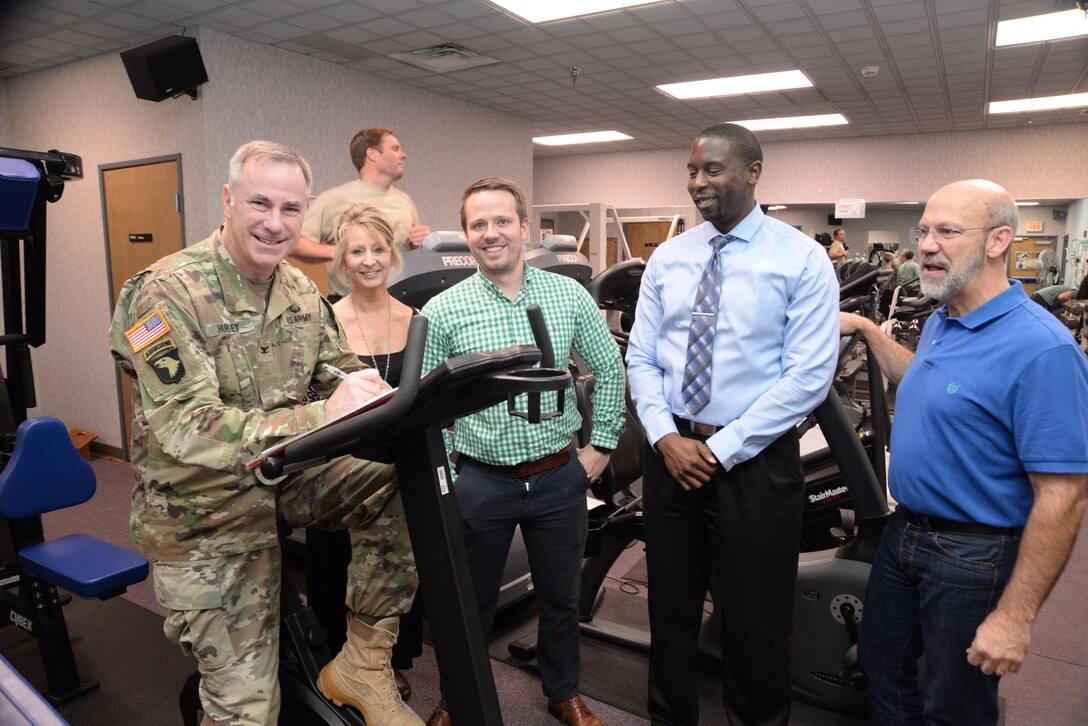 Col. John Hurley, commander of the U.S. Army Engineering and Support Center, Huntsville, signs up for the 2018 Commander’s Fitness Challenge at the organization’s Wellness Center. Next to Hurley are members of the Huntsville Center Wellness Committee.