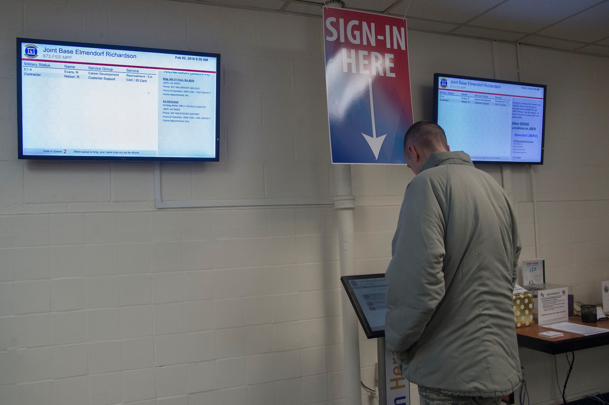 Tech. Sgt. Michael Thomas checks in at the kiosk at the Military Personnel Section lobby at Joint Base Elmendorf-Richardson, Alaska, Feb. 2, 2018. The MPS check-in kiosk has recently added several updates, including a new online sign-in feature.