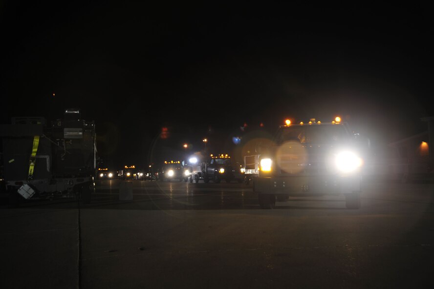 Trucks from the 355th Logistics Readiness Squadron wait in line to weigh their cargo at Davis-Monthan Air Force Base, Ariz., Feb. 9, 2018.