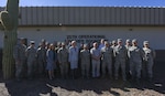 Officials from the U.S. Southern Command pose for a group photo at Davis-Monthan Air Force Base, Ariz., Feb. 6, 2018. Meteorology and oceanography specialists from various sections of the Department of Defense gathered for a 2-day-long USSOUTHCOM-sponsored conference that allowed them to discuss lessons learned from 2017 and ways to better communicate with one another in the future. (U.S. Air Force photo by Airman 1st Class Frankie D. Moore)