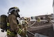 Firefighters assigned to the 332d Expeditionary Civil Engineer Squadron respond to a simulated structure fire during a coalition emergency response exercise February 9, 2017 at an undisclosed location in Southwest Asia. After a simulated casualty was located and rescued by the U.S. Airmen, treatment was quickly administered by a German Air Force paramedic team. (Air Force photo by Staff Sgt. Joshua Kleinholz)